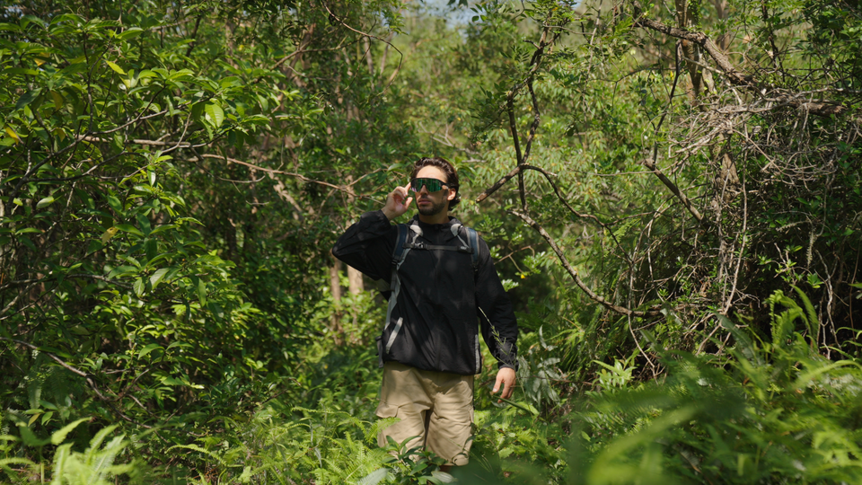 POVEC C1 Sunglasses worn on a forest trail