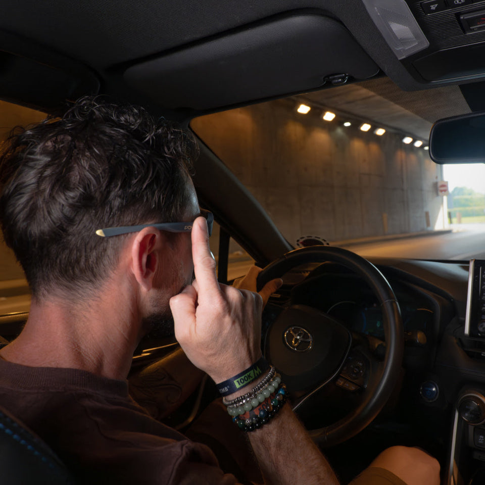 POVEC C1 Sunglasses worn in a car